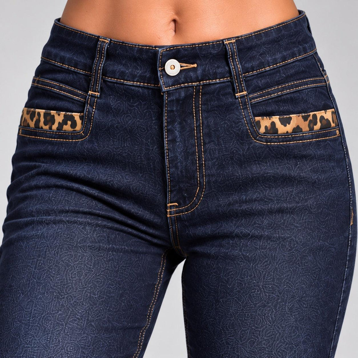 Jeans skinny con fascia maculato