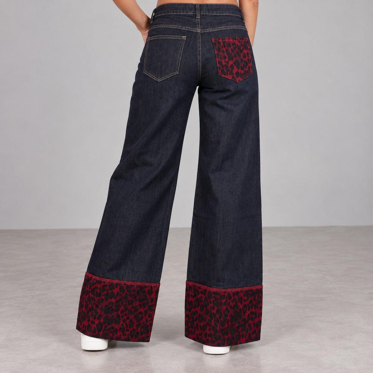 Jeans wide leg con fascia maculato