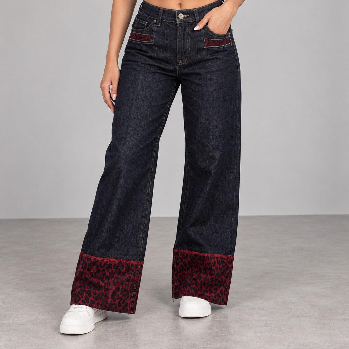 Jeans wide leg con fascia maculato