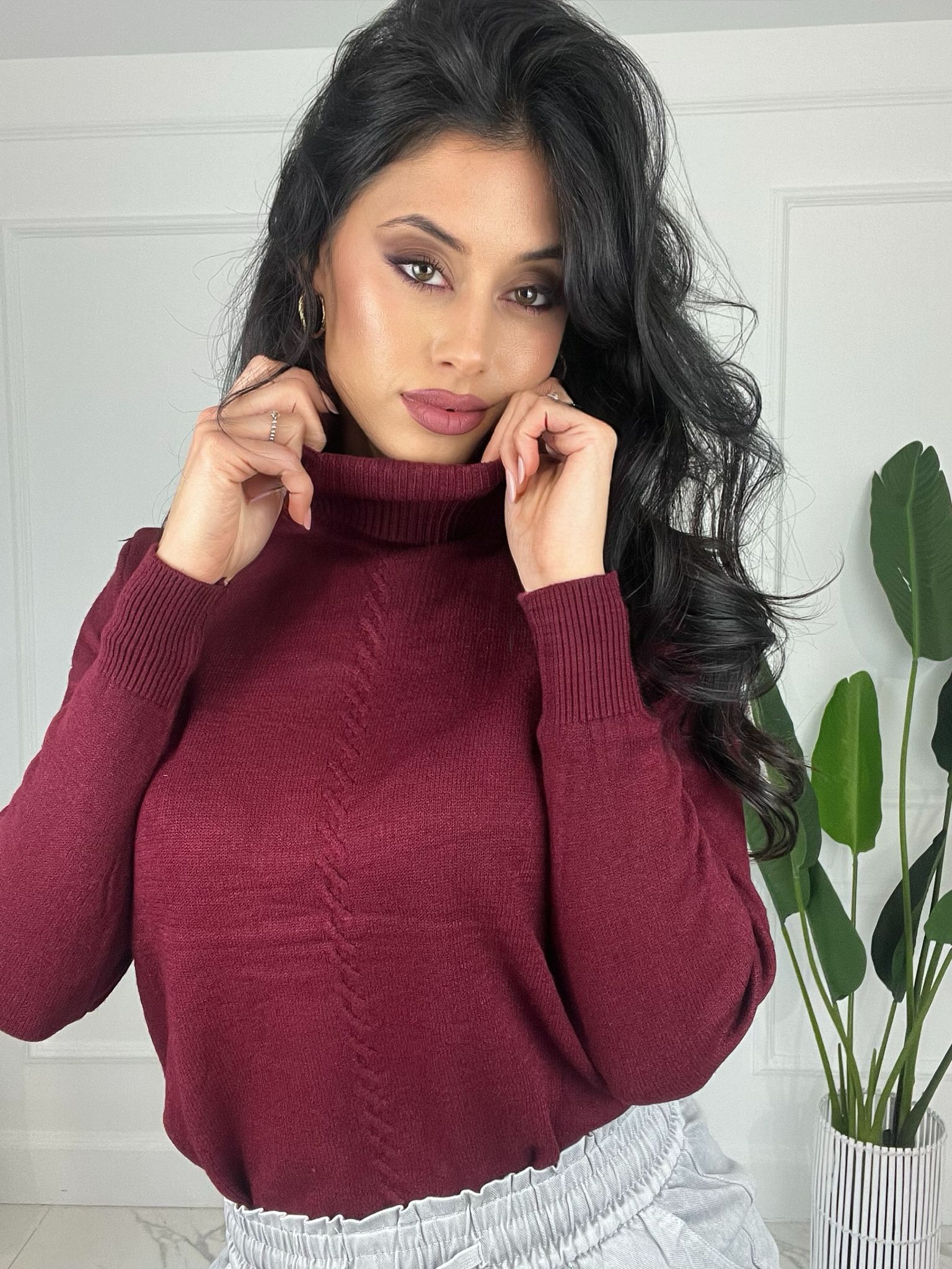 Pull collo alto Treccia